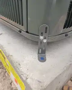 Riverview HVAC Replacement 3 Anchored 4 inch concrete pad after installation of new unit.